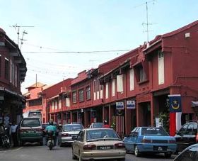 Image: Shophouses at Jalan Laksamana have been repainted red from the yellow, blue and purple."