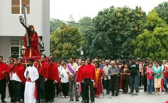 Picture: Good turnout: The procession taking a turn around the church compound"