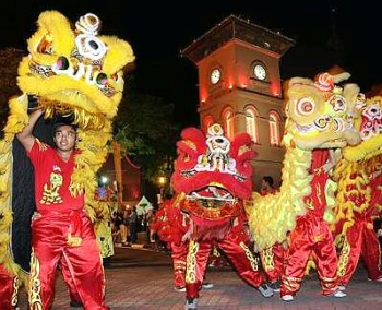 Image: A troupe showing off its lion-dance skills"