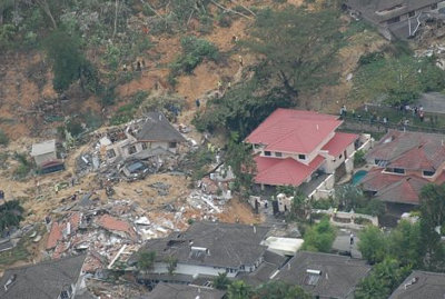 Afbeelding: Een van de getroffen bungalows in Bukit Antarabangsa."