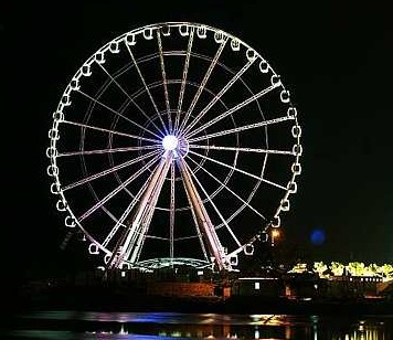 Image: Bright eyes: The 60m Eye on Malaysia situated next to the Malacca River mouth is also decorated with stunning lights at night."