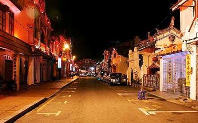 Image: Famous street: The Jonker Street is decorated with red lights at night."
