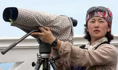 Image: Keen birdwatcher: Motoko Saeki from Japan was among the foreign participants who gathered at Tanjung Tuan."