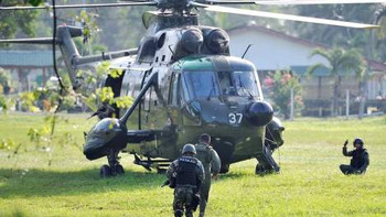 Afbeelding: Maleisische soldaten."